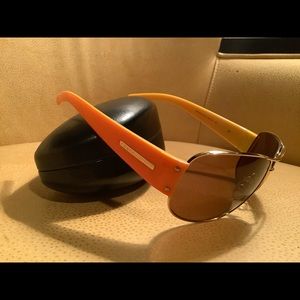 Prada Aviator SunGlasses. Orange and Gold frames.